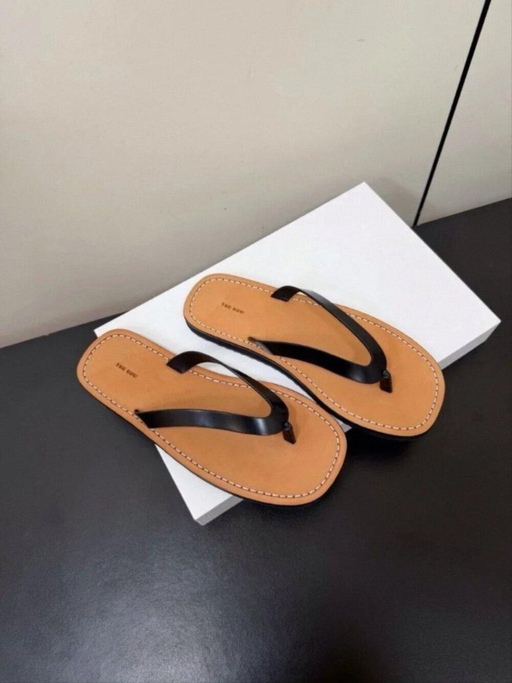 Women’s Tan Leather Flip-Flop Sandals with Black Straps